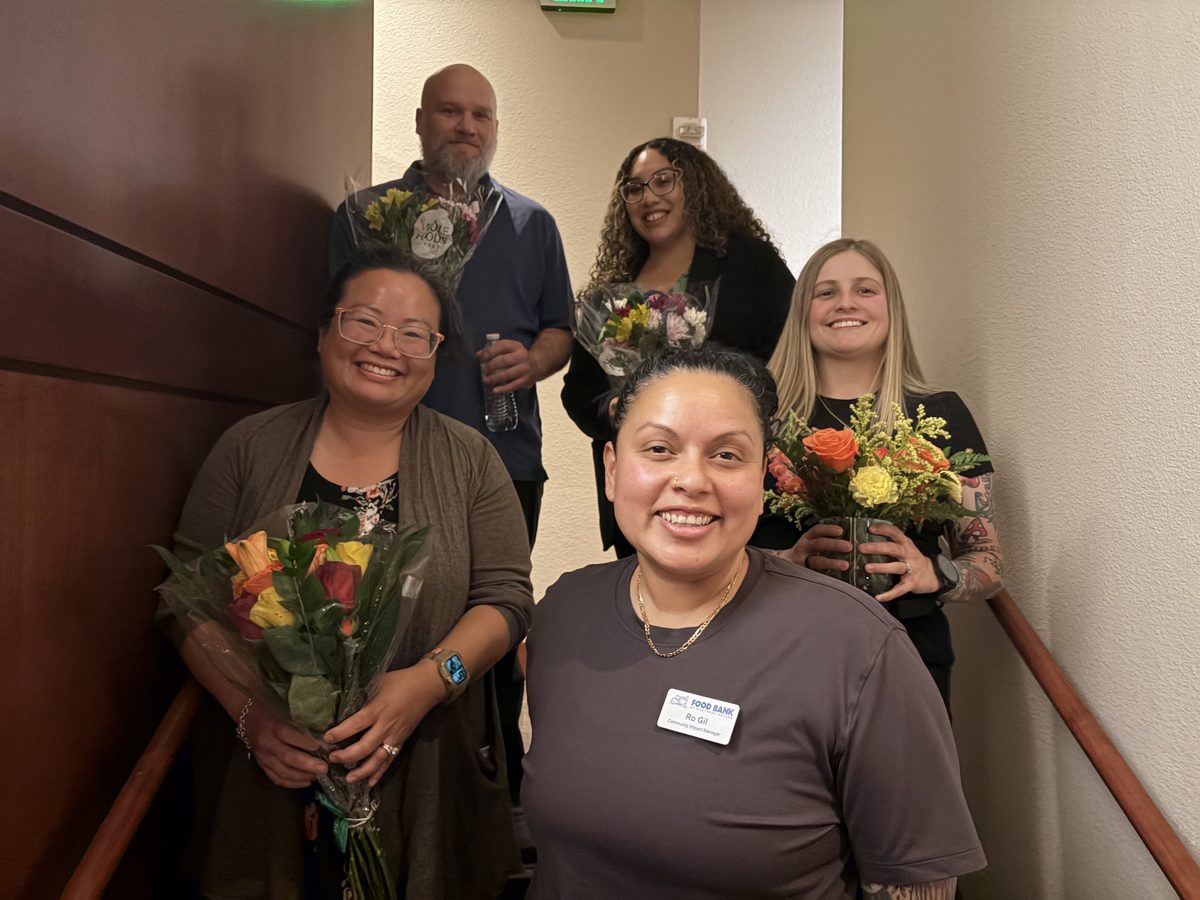 ABLE team members celebrating together at a community event